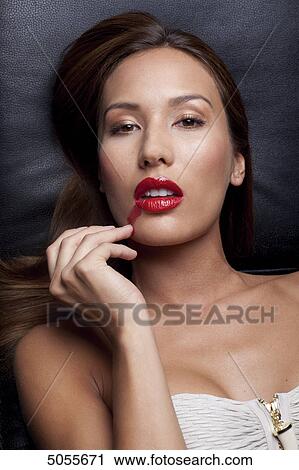 Stock Image - Young woman, portrait . Fotosearch