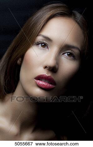 Stock Photo - Young woman, portrait . Fotosearch