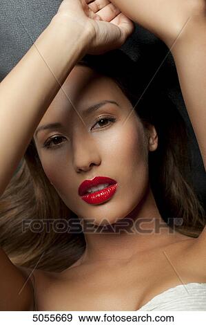 Stock Photo - Young woman, portrait . Fotosearch