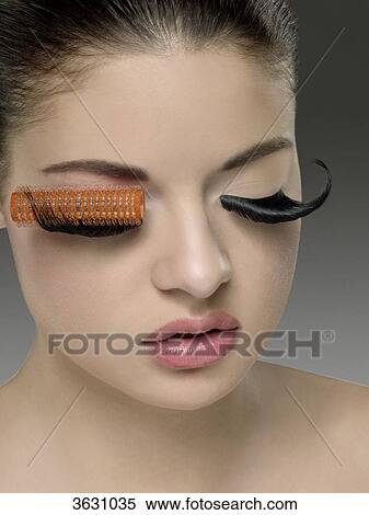 Young woman with artificial eyelashes, close-up View Large Photo Image Stock Photography - Young woman with artificial eyelashes, close-up . Fotosearch