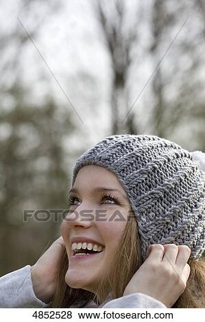 Young woman with woollen hat View Large Photo Image Stock Photo - Young woman with woollen hat . Fotosearch