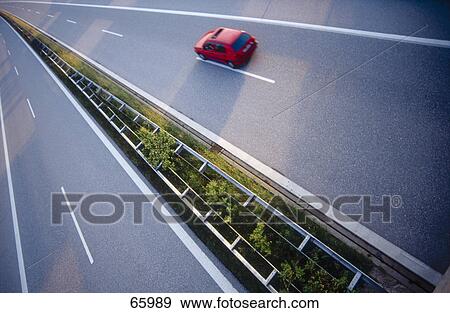 Aerial view of car on highway View Large Photo Image Stock Photo - Aerial view of car on highway . Fotosearch