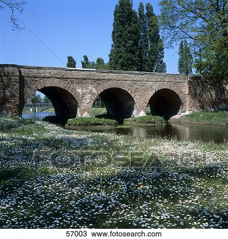 Ancient bridge across river, Emilia Romagna, Italia View Large Photo Image Stock Image - Ancient bridge across river, Emilia Romagna, Italia . Fotosearch