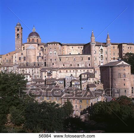 Picture - Ancient palace against blue sky in city, Palazzo Ducale, Urbino, Marches, Italy . Fotosearch