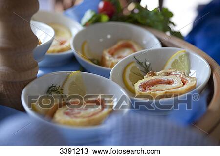 Appetiser with salmon in small bowls, close-up View Large Photo Image Stock Image - Appetiser with salmon in small bowls, close-up . Fotosearch