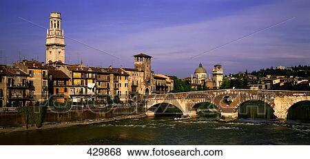 Stock Photo - Bridge across river in city, Old Town, Verona, Veneto, Italy . Fotosearch