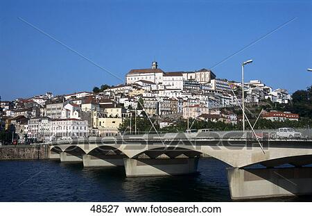 Stock Photo - Bridge across river, Santa Clara Bridge, Mondego River, Coimbra, Lisbon, Portugal . Fotosearch