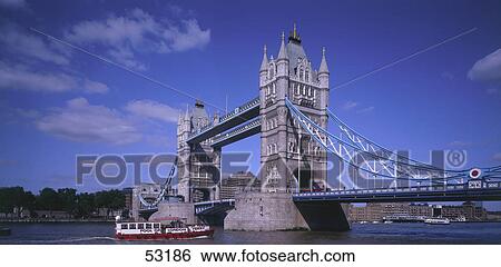 Bridge across river, Tower Bridge, Thames River, London, England View Large Photo Image Stock Photograph - Bridge across river, Tower Bridge, Thames River, London, England . Fotosearch
