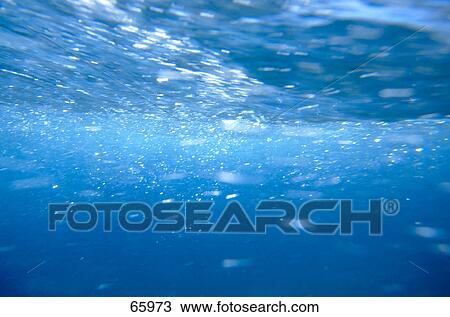 Stock Image - Bubbles in water . Fotosearch