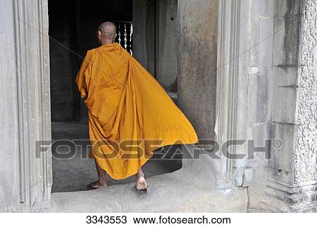 Buddhist monk in a temple, Angkor, Cambodia, rear view View Large Photo Image Stock Image - Buddhist monk in a temple, Angkor, Cambodia, rear view . Fotosearch