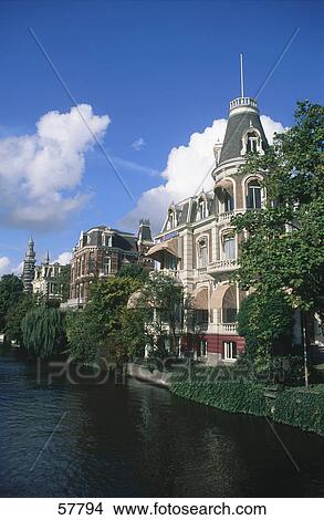 Picture - Buildings at riverbank, Gracht, Amsterdam, Netherlands . Fotosearch
