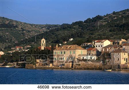 Stock Photo - Buildings at waterfront, Vis Island, Dalmatia, Croatia . Fotosearch