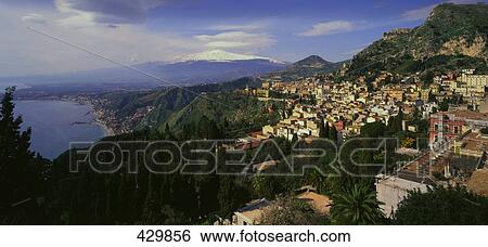 Buildings in town, Taormina, Naxos, Sicily, Italy View Large Photo Image Stock Photograph - Buildings in town, Taormina, Naxos, Sicily, Italy . Fotosearch