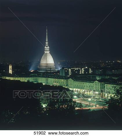 Stock Image - Buildings lit up at night, Mole Antonelliana, Turin, Piemont, Italy . Fotosearch