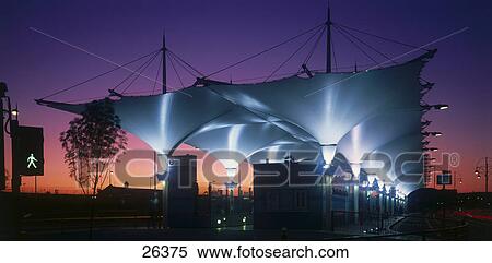 Bus station lit up at night, Stratford, London, England View Large Photo Image Stock Photography - Bus station lit up at night, Stratford, London, England . Fotosearch