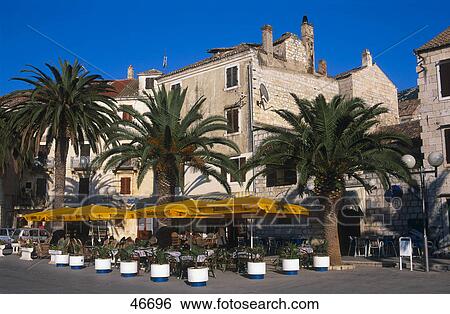 Stock Photograph - Cafe at roadside, Komiza, Vis, Dalmatia, Croatia . Fotosearch