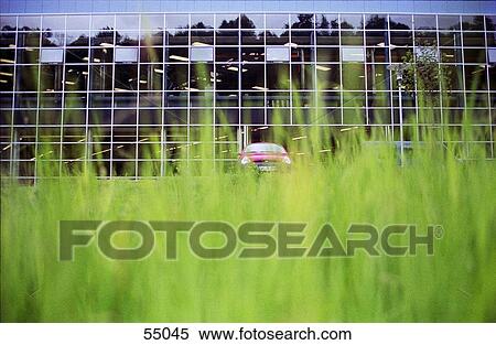 Stock Photography - Car in front of office building . Fotosearch
