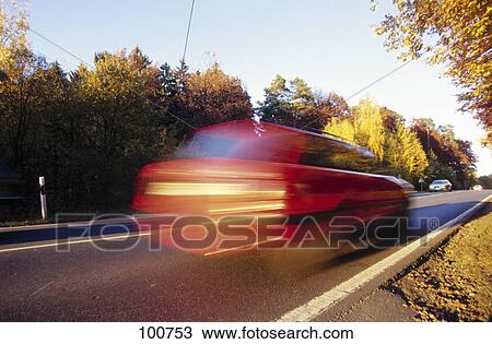 Car moving on road View Large Photo Image Stock Image - Car moving on road . Fotosearch