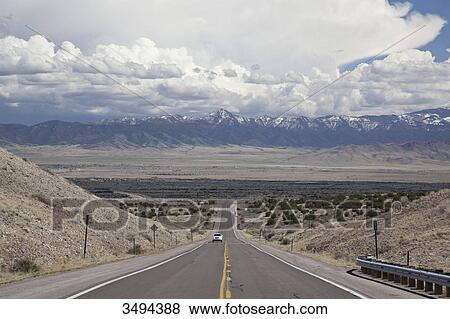 Car on a country road, Valley of Fires, New Mexico, USA, elevated view View Large Photo Image Stock Photo - Car on a country road, Valley of Fires, New Mexico, USA, elevated view . Fotosearch