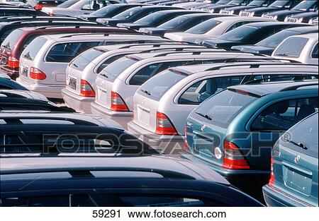 Cars parked at parking lot View Large Photo Image Stock Image - Cars parked at parking lot . Fotosearch