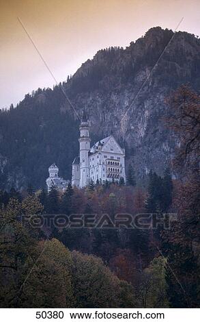 Stock Image - Castle near mountain, Neuschwanstein Castle, Bavarian Alps, Bavaria, Germany . Fotosearch