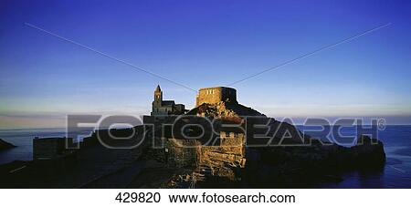 Stock Image - Castle on hill, San Pietro, Portovenere, Cinque Terre, Liguria, Italy . Fotosearch