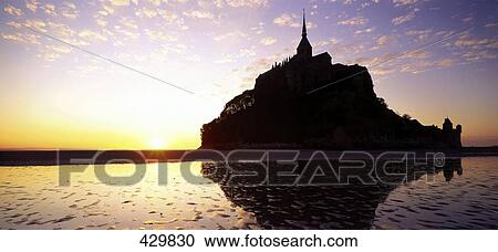 Cathedral on island at dusk, Mont Saint-Michel, Normandy, France View Large Photo Image Stock Image - Cathedral on island at dusk, Mont Saint-Michel, Normandy, France . Fotosearch