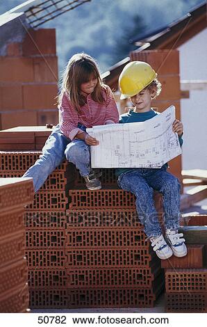 Children holding blueprint View Large Photo Image Stock Image - Children holding blueprint . Fotosearch