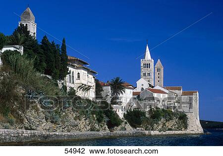 Church on cliff against blue sky, Rab Island, Dalmatia, Croatia  View Large Photo Image Stock Image - Church on cliff against blue sky, Rab Island, Dalmatia, Croatia . Fotosearch