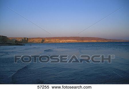 Cliffs on a waterfront under blue sky, Red Sea, Sinai, Egypt View Large Photo Image Stock Photography - Cliffs on a waterfront under blue sky, Red Sea, Sinai, Egypt . Fotosearch