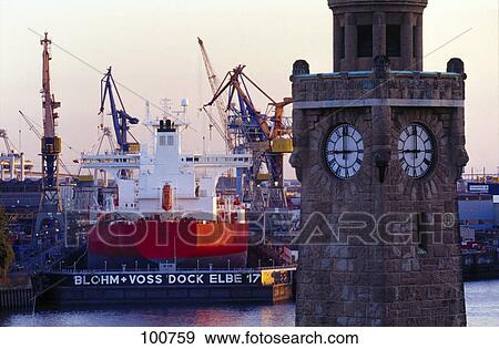 Clock tower and ship at harbor, Hamburg, Germany View Large Photo Image Stock Photo - Clock tower and ship at harbor, Hamburg, Germany . Fotosearch