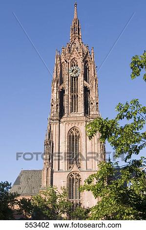 Stock Image - Clock tower of church, Frankfurt Cathedral, Frankfurt, Hesse, Germany . Fotosearch