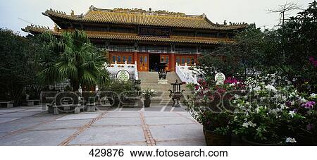 Cloister in the feet of Tian Tan Buddha statue, Ngong Ping, Lantau Island, Hong Kong View Large Photo Image Stock Photograph - Cloister in the feet of Tian Tan Buddha statue, Ngong Ping, Lantau Island, Hong Kong . Fotosearch