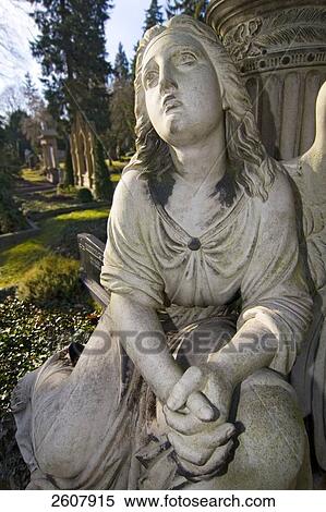 Stock Photography - Close-up of angel sculpture . Fotosearch