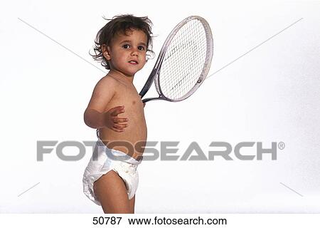 Close-up of baby holding tennis racket View Large Photo Image Stock Photo - Close-up of baby holding tennis racket . Fotosearch