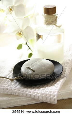 Stock Photograph - Close-up of bar of soap in soap dish . Fotosearch