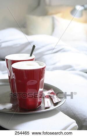 Close-up of coffee cups on table View Large Photo Image Stock Photography - Close-up of coffee cups on table . Fotosearch