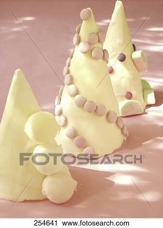 Close-up of cone shape candies View Large Photo Image Stock Image - Close-up of cone shape candies . Fotosearch