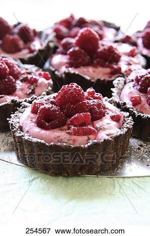 Close-up of creamy raspberry pastries View Large Photo Image Stock Photo - Close-up of creamy raspberry pastries . Fotosearch