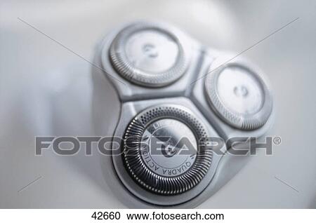 Stock Image - Close-up of electric razor . Fotosearch