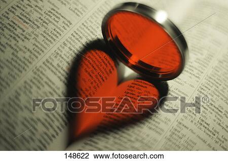 Close-up of glass lens with heart shaped shadow View Large Photo Image Stock Image - Close-up of glass lens with heart shaped shadow . Fotosearch