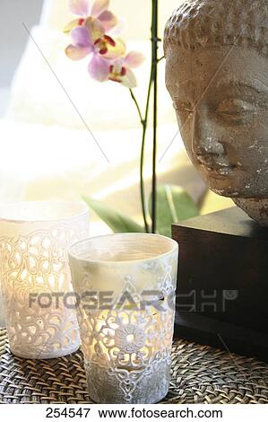 Close-up of lamps and statue of Buddha View Large Photo Image Stock Photo - Close-up of lamps and statue of Buddha . Fotosearch