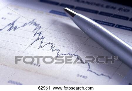 Stock Image - Close-up of line graph and pen . Fotosearch