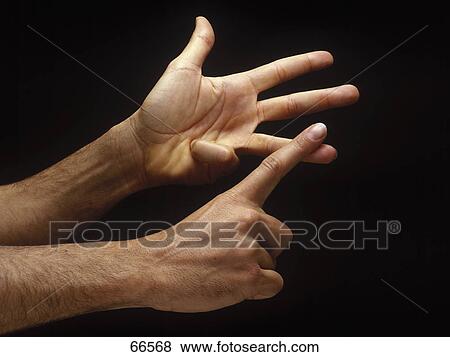 Close-up of man counting on his fingers View Large Photo Image Stock Photo - Close-up of man counting on his fingers . Fotosearch