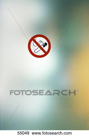 Stock Photo - Close-up of No Smoking sign board . Fotosearch