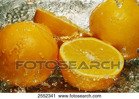 Close-up of oranges and water View Large Photo Image Stock Image - Close-up of oranges and water . Fotosearch