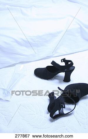 Stock Photo - Close-up of pair of high heels . Fotosearch