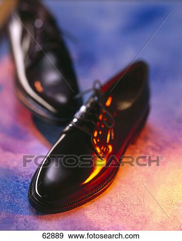 Stock Photo - Close-up of pair of shoes . Fotosearch