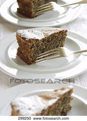 Close-up of pastries and forks on plates View Large Photo Image Stock Image - Close-up of pastries and forks on plates . Fotosearch