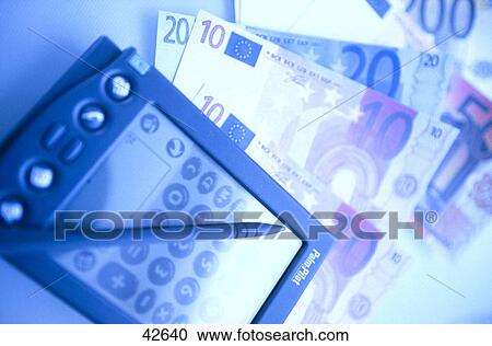 Close-up of personal data assistant and paper currency View Large Photo Image Stock Image - Close-up of personal data assistant and paper currency . Fotosearch